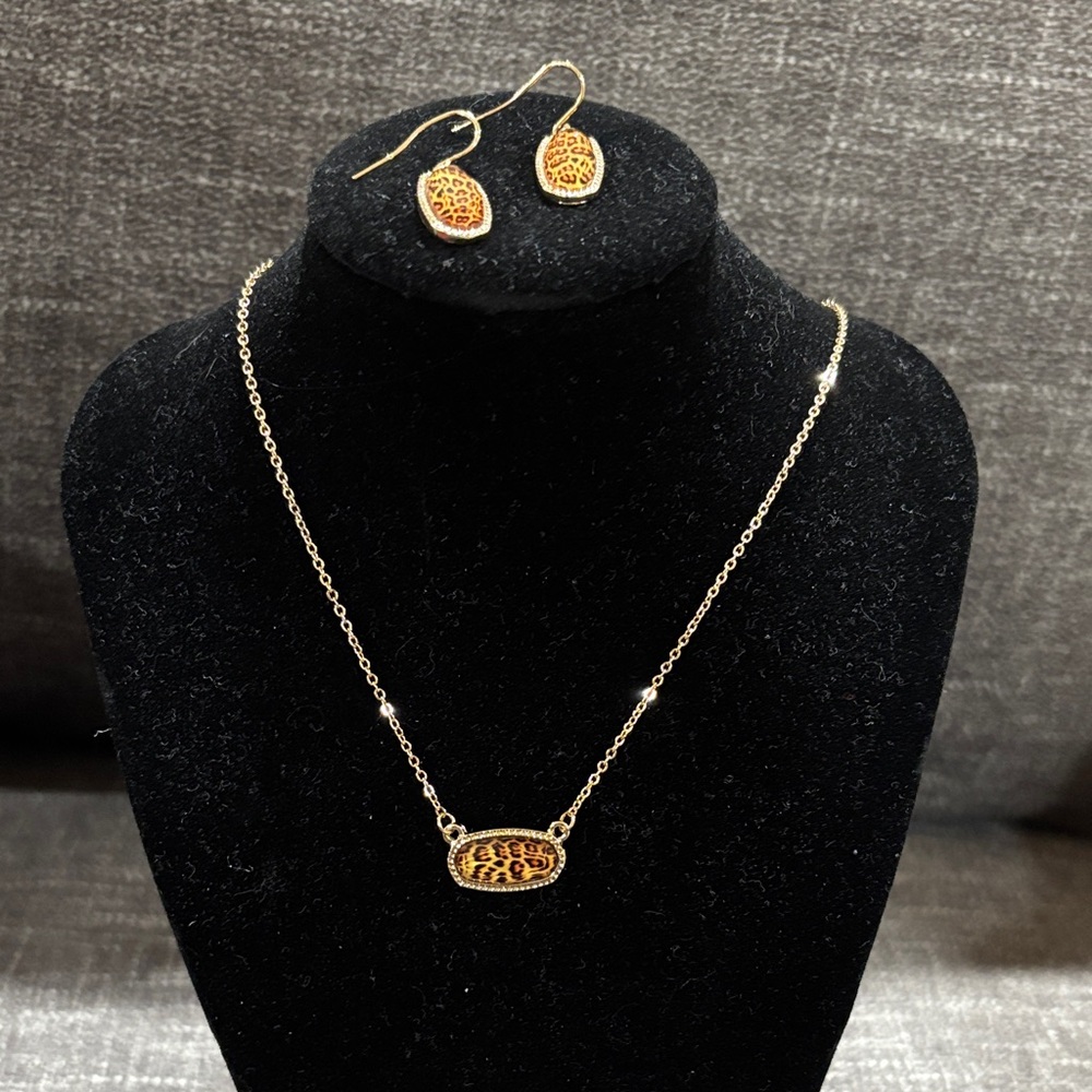 Gold tone cheetah necklace and earrings set